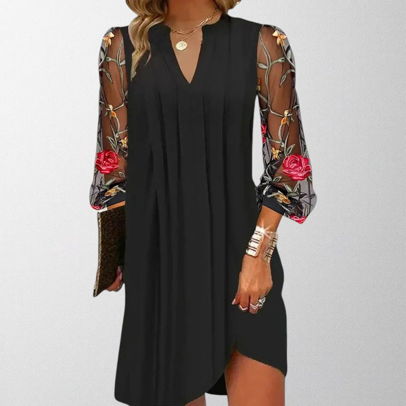 Olivia - Elegant mini dress with V-neck and transparent sleeves